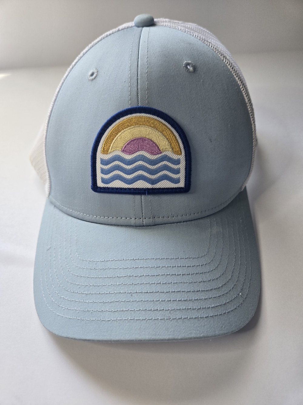 Columbia Light Blue Sunrise Patch Trucker Hat – Mesh Back – Adjustable